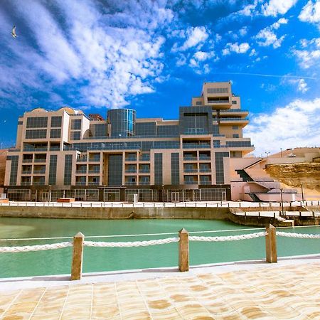 Caspian Riviera Grand Palace Hotel Aktau  Exterior photo The new building of the University of Jordan