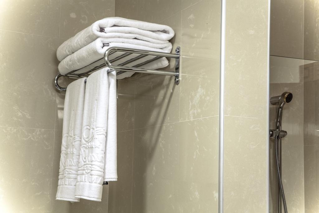 Caspian Riviera Grand Palace Hotel Aktau  Exterior photo Towels in a bathroom