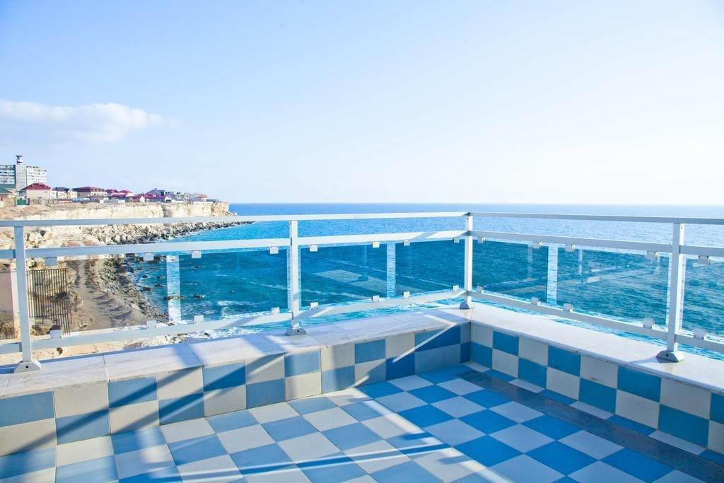 Caspian Riviera Grand Palace Hotel Aktau  Exterior photo The sea view from the terrace of the museum