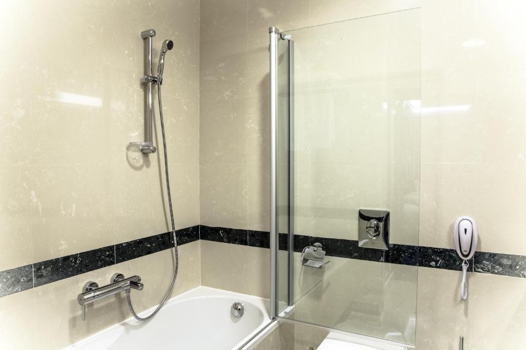 Caspian Riviera Grand Palace Hotel Aktau  Exterior photo A shower bath