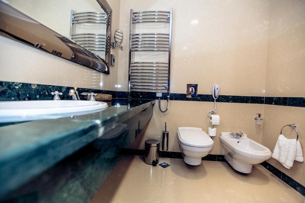 Caspian Riviera Grand Palace Hotel Aktau  Exterior photo A modern bathroom