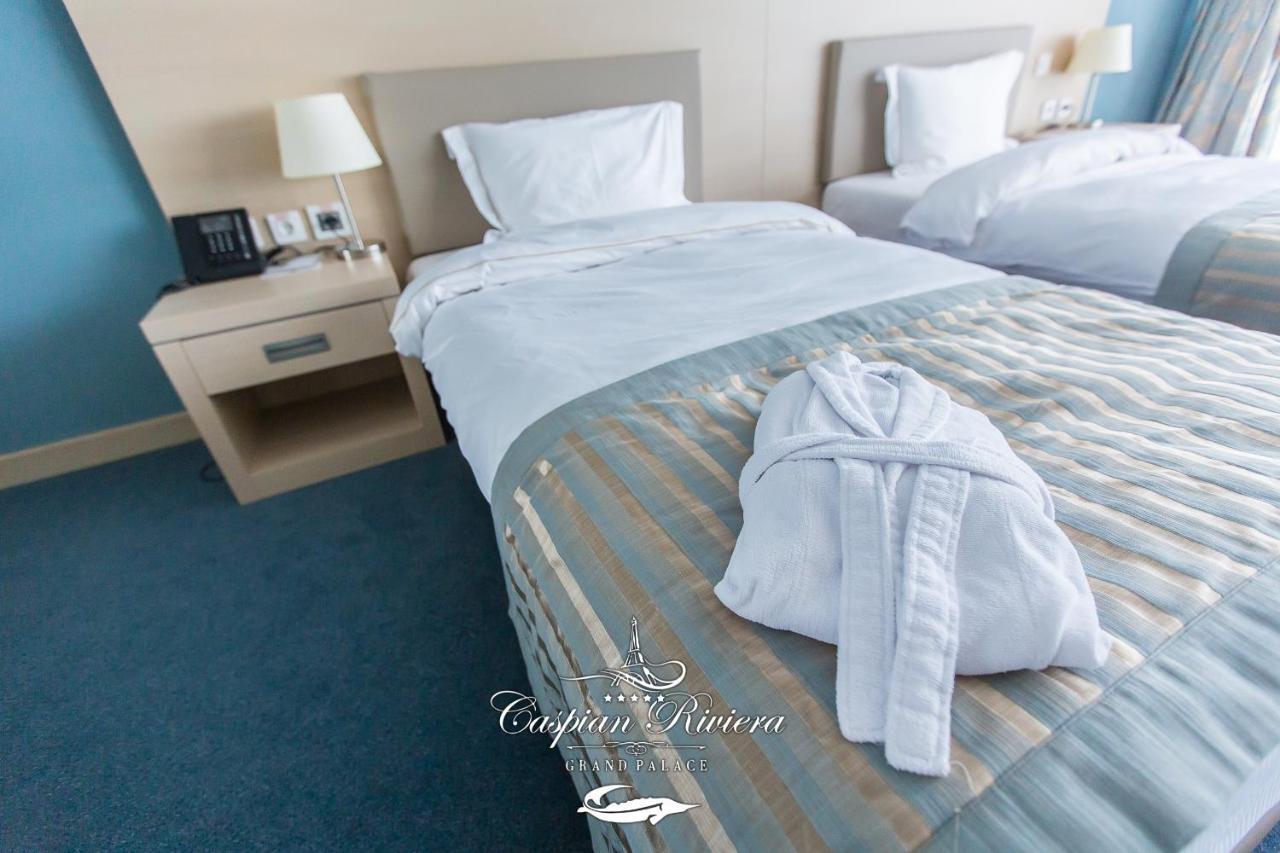 Caspian Riviera Grand Palace Hotel Aktau  Exterior photo A room at the hotel